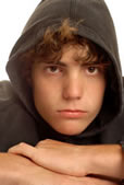 sad young man in hoodie